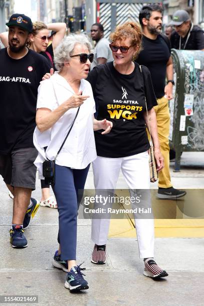 Bette Midler and Susan Sarandon are seen at the SAG-AFTRA strike picket line on July 18, 2023 in New York City.