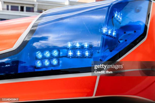 emergency light on an ambulance car - emergency services vehicle stock pictures, royalty-free photos & images
