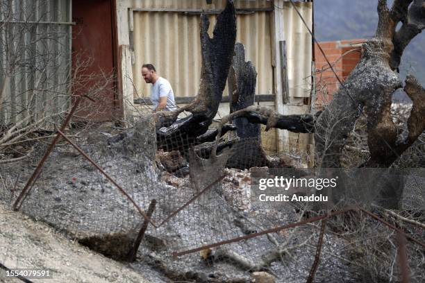 View of the site as deadly wildfires ravage settlements along the country's Mediterranean coast and firefighters continue their efforts to extinguish...