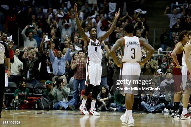 Larry Sanders of the Milwaukee Bucks gets the crowd involved during the game against the Cleveland Cavaliers at Bradley Center on November 3, 2012 in...