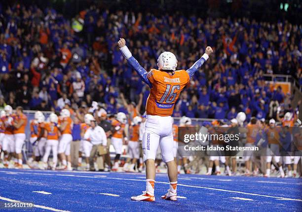 Boise State's Joe Southwick celebrates D.J. Harper's second touchdown of the game against San Diego State at Bronco Stadium on Saturday, November 3...