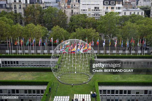 This general view taken on July 25 shows "Le Globe Symbolique" by Erik Reitzel on display at The United Nations' educational, scientific and cultural...