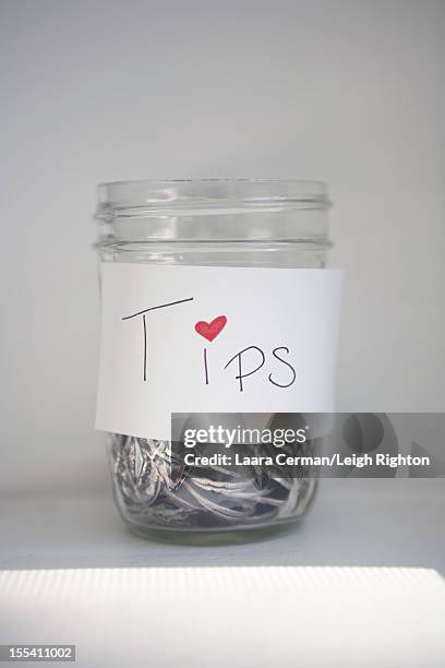 tip jar - tip jar stock pictures, royalty-free photos & images