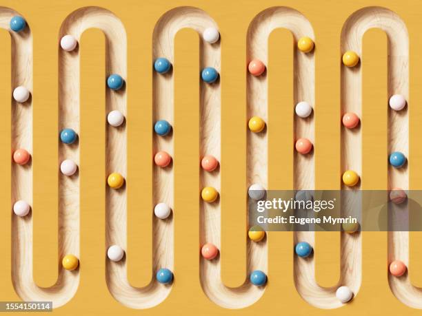 3d image of rolling spheres along a path. - zigzag path stock pictures, royalty-free photos & images