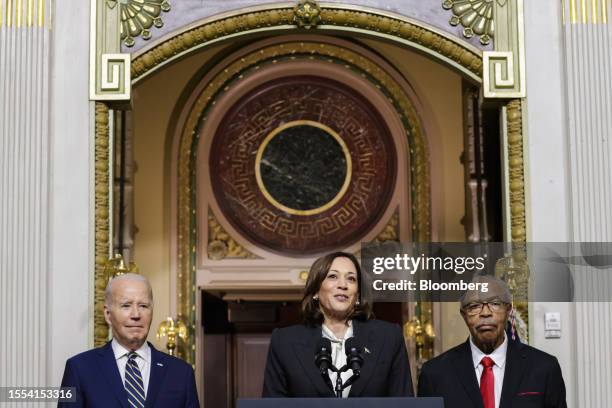 President Joe Biden, from left, US Vice President Kamala Harris. And Reverend Wheeler Parker Jr., a member of the Till Family, before signing a...