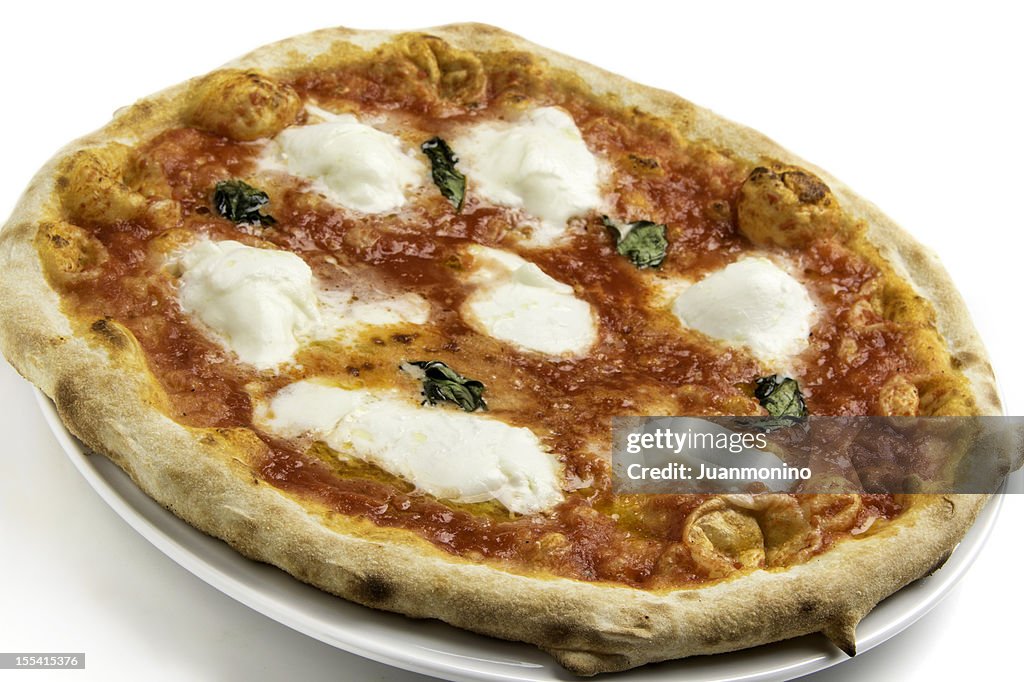 A pizza margherita on a white background.