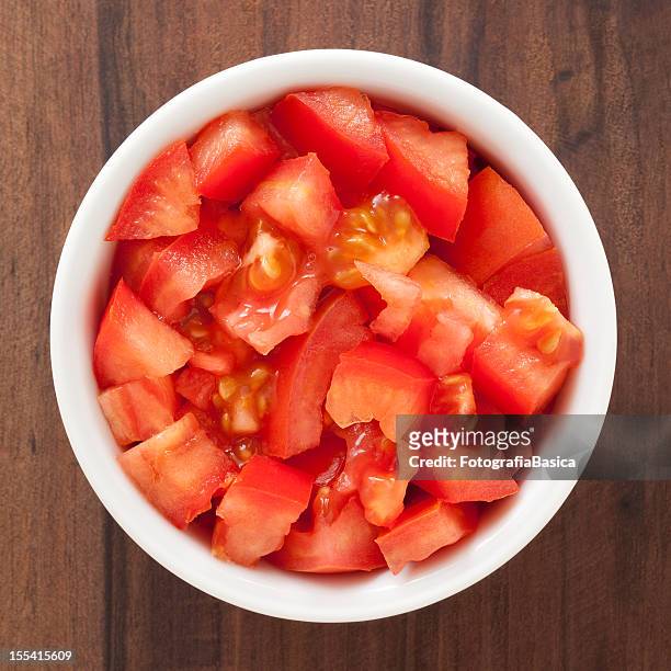 diced tomato - tomatoes stock pictures, royalty-free photos & images