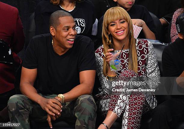 Jay-Z and Beyonce Knowles attend Toronto Raptors vs Brooklyn Nets game at Barclays Center on November 3, 2012 in Brooklyn, New York.