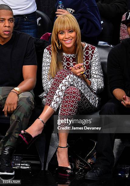 Jay-Z and Beyonce Knowles attend Toronto Raptors vs Brooklyn Nets at Barclays Center on November 3, 2012 in Brooklyn, New York.