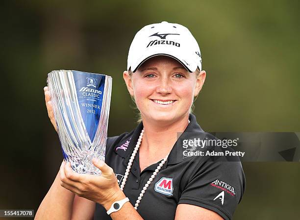 Stacy Lewis of the USA celebrates with the trophy after winning the Mizuno Classic at Kintetsu Kashikojima Country Club on November 4, 2012 in Shima,...