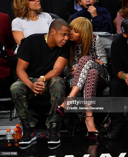 Jay-Z and Beyonce Knowles attend Toronto Raptors vs Brooklyn Nets game at Barclays Center on November 3, 2012 in Brooklyn, New York.