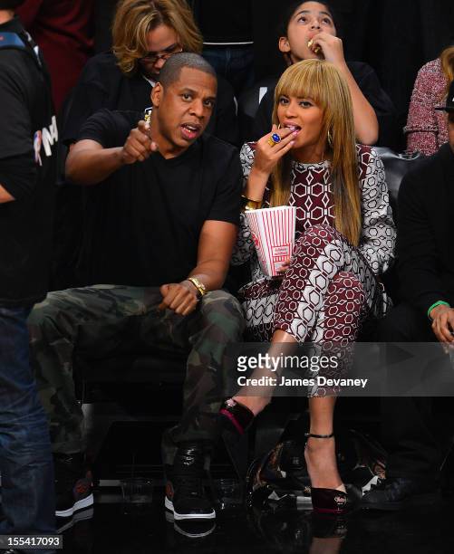 Jay-Z and Beyonce Knowles attend Toronto Raptors vs Brooklyn Nets game at Barclays Center on November 3, 2012 in Brooklyn, New York.