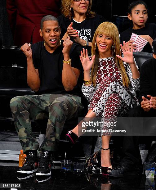 Jay-Z and Beyonce Knowles attend Toronto Raptors vs Brooklyn Nets game at Barclays Center on November 3, 2012 in Brooklyn, New York.