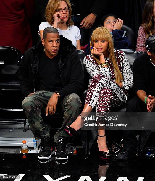Jay-Z and Beyonce Knowles attend Toronto Raptors vs Brooklyn Nets game at Barclays Center on November 3, 2012 in Brooklyn, New York.