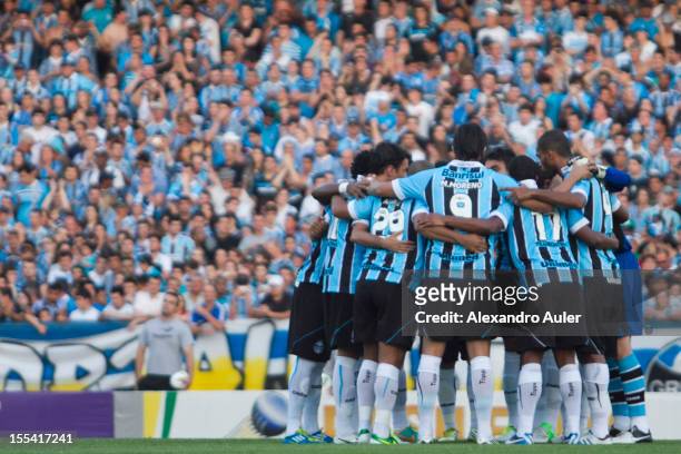 Players of Gremio celebrate a goal during a match between Grêmio and Ponte Preta as part of the Brazilian Championship Serie A at Olímpico stadium on...