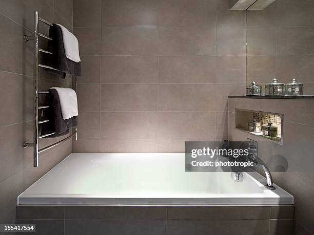 steaming hot bath - towel rail stock pictures, royalty-free photos & images