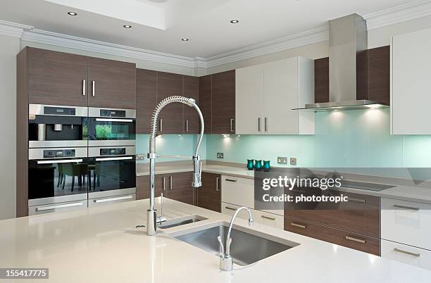 lovely kitchen - metal kitchen worktop stock pictures, royalty-free photos & images