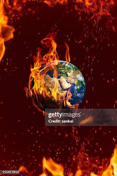 earth is on fire, global danger concept - earth-on-fire stock pictures, royalty-free photos & images