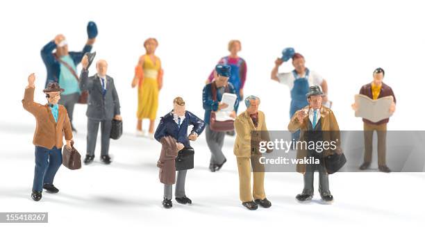 little people on white background - beeldje stockfoto's en -beelden