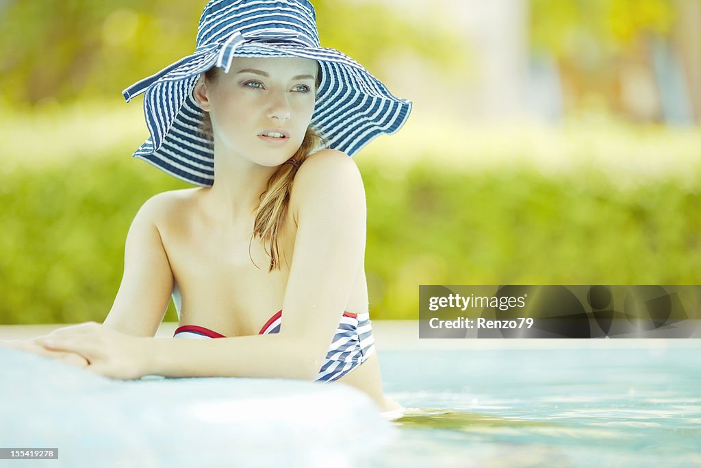 Posing in a pool