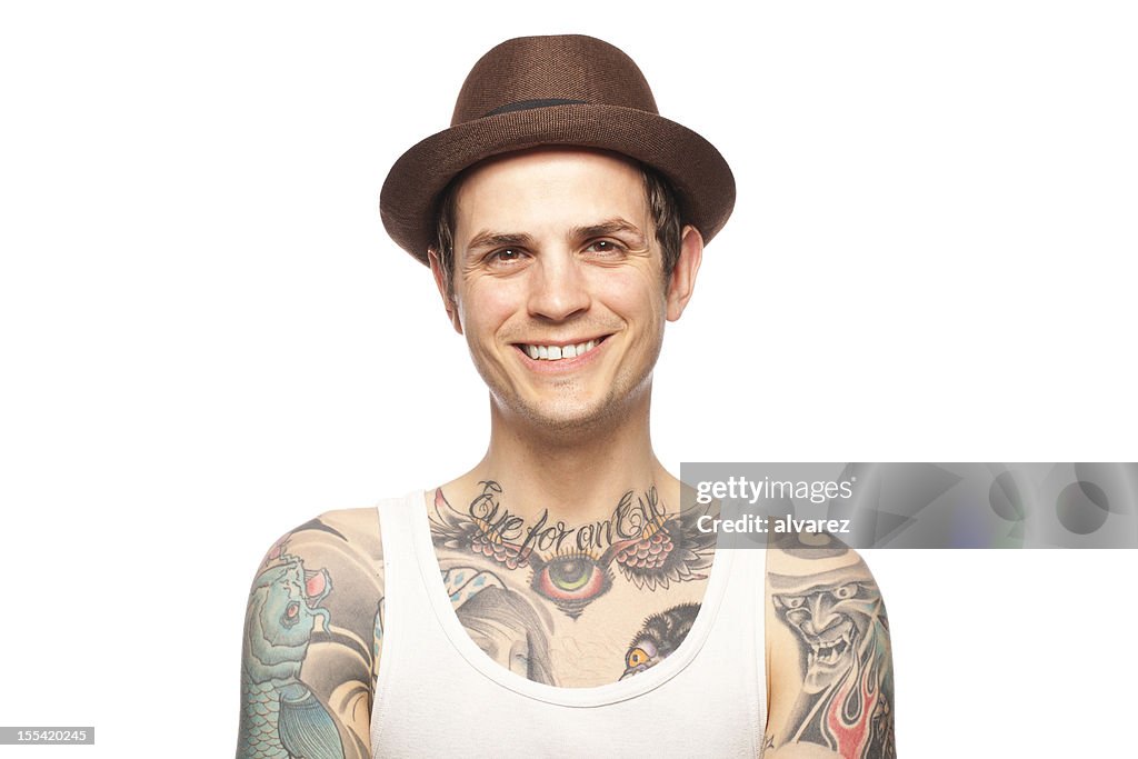 Portrait of a smiling tattooed man