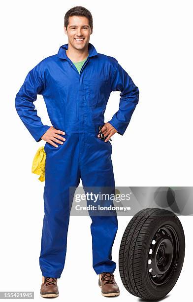 car mechanic and spare tire- isolated - tuinbroek stockfoto's en -beelden