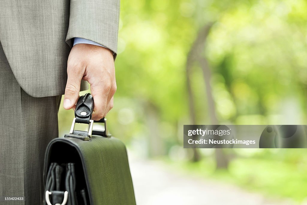 Male Executive Holding Briefcase