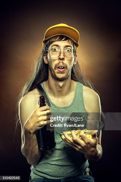 goofy redneck with beer and chips - hillbilly stock pictures, royalty-free photos & images