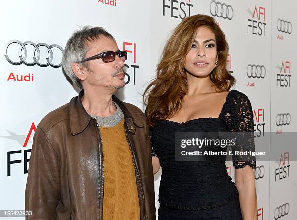 Director/Writer Leos Carax and actress Eva Mendes arrive at the "Holy Motors" special screening during the 2012 AFI Fest at Grauman's Chinese Theatre...