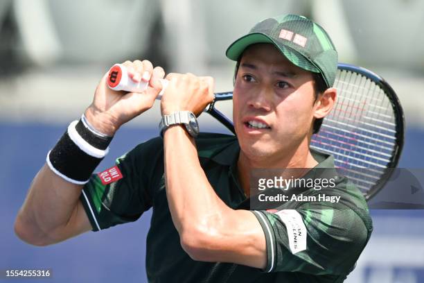 Kei Nishikori of Japan hits a shot against Jordan Thompson during the first round of the ATP Atlanta Open at Atlantic Station on July 25, 2023 in...
