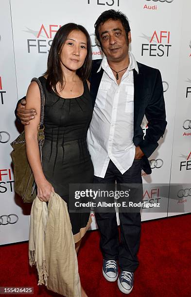 Producer Yoon Cho and director Anirban Roy arrive at the "Holy Motors" special screening during the 2012 AFI Fest at Grauman's Chinese Theatre on...
