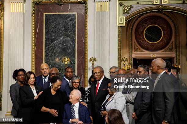 President Joe Biden, center, after signing a proclamation to establish the Emmett Till and Mamie Till-Mobley National Monument in the Indian Treaty...