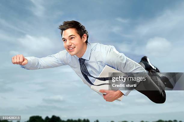 flying businessman - man flying stockfoto's en -beelden