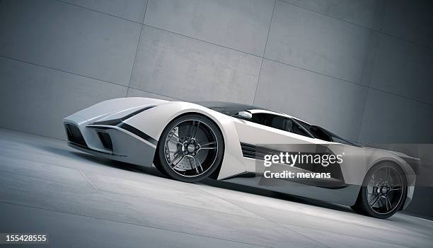 ground view of a white and black sports car with sharp edges - supercars stock pictures, royalty-free photos & images