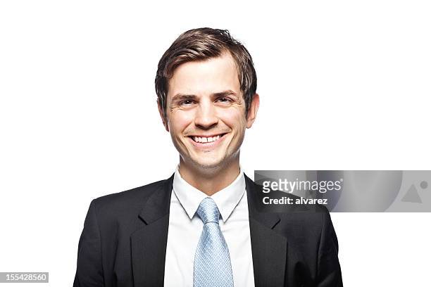 portrait d'un homme d'affaires souriante. - cravate fond blanc photos et images de collection