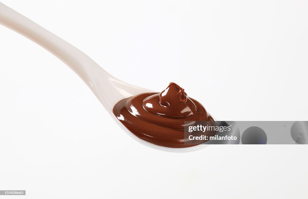 A white spoonful of chocolate mousse