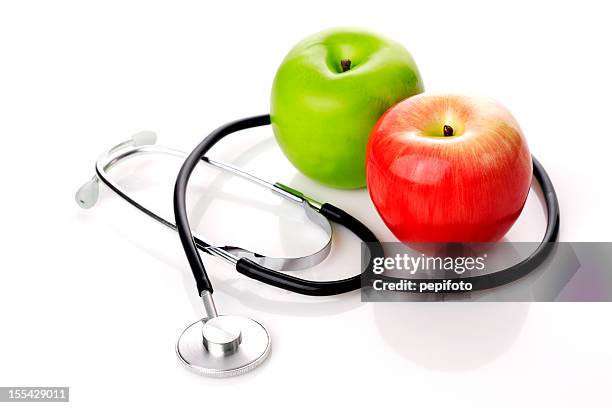 stethoscope and apples - red stethoscope stock pictures, royalty-free photos & images