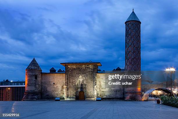 old stone building and tower of yakutiye medresse at night - madressa stock pictures, royalty-free photos & images