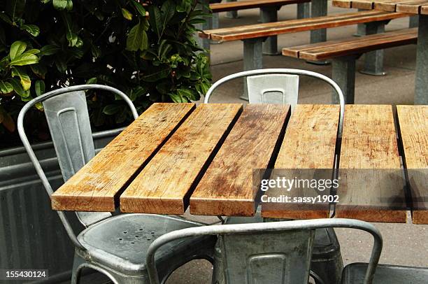 cafe outdoor patio dining - picnic table stock pictures, royalty-free photos & images