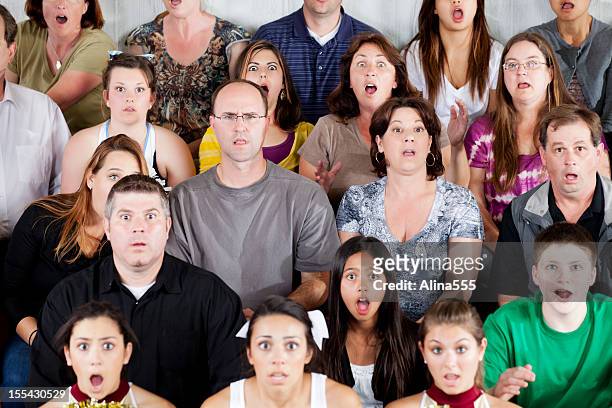 large diverse group of people shocked at the game - bleachers stock pictures, royalty-free photos & images