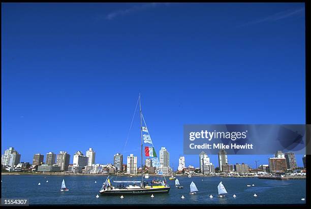 THE ITALIAN BOAT BROOKSFIELD IS DWARFED BY THE CITY OF PUNTA DEL ESTE, URUGUAY, AS SHE COMPLETES LEG 1 OF THE WHITBREAD ROUND THE WORLD YACHT RACE.