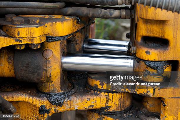 hydraulic piston - grease stock pictures, royalty-free photos & images