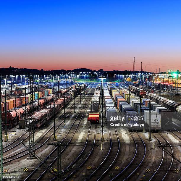 freight trains, waggons and railways - train yard at night stock pictures, royalty-free photos & images