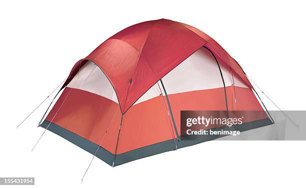 red and white camping tent pitched to the ground - tent stockfoto's en -beelden