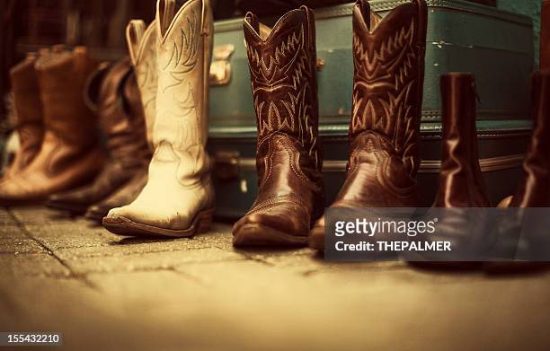 cowboy boots for sale - boot sale stock pictures, royalty-free photos & images
