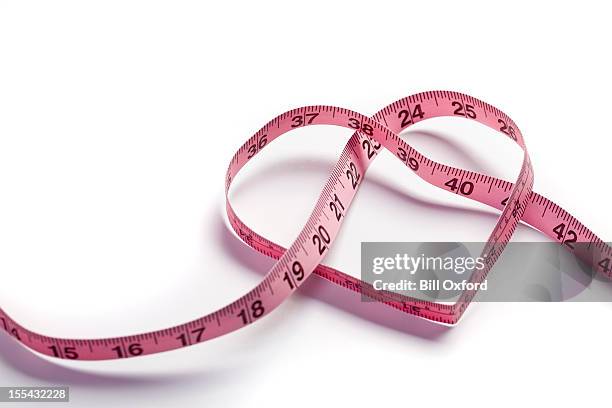 heart measuring tape - centimeter stockfoto's en -beelden