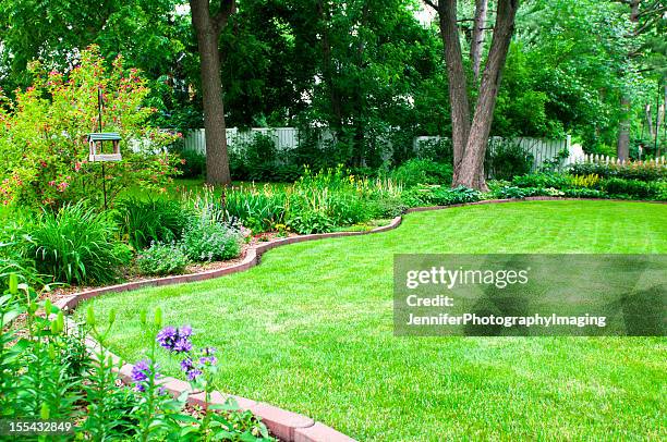 backyard flower bed - garden lawn stock pictures, royalty-free photos & images