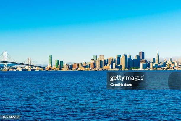 san francisco skyline and bay bridge from treasure island - treasure island san francisco stock pictures, royalty-free photos & images