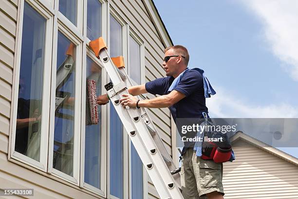 window washing professional - window cleaning stock pictures, royalty-free photos & images