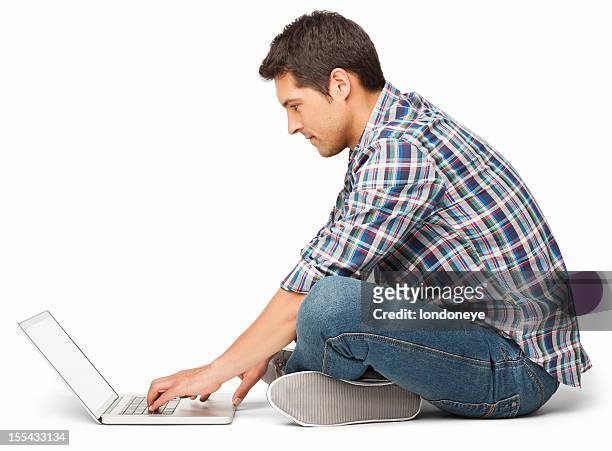 young man using laptop - isolated - cross legged stock pictures, royalty-free photos & images